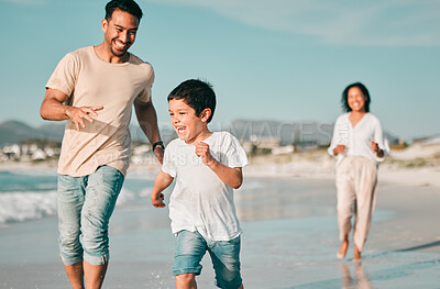 Buy stock photo Family, father and son running on beach with mother, ocean and energy with bonding on holiday, happiness and freedom. Parents, boy and carefree on tropical vacation in Mexico, love and care outdoor