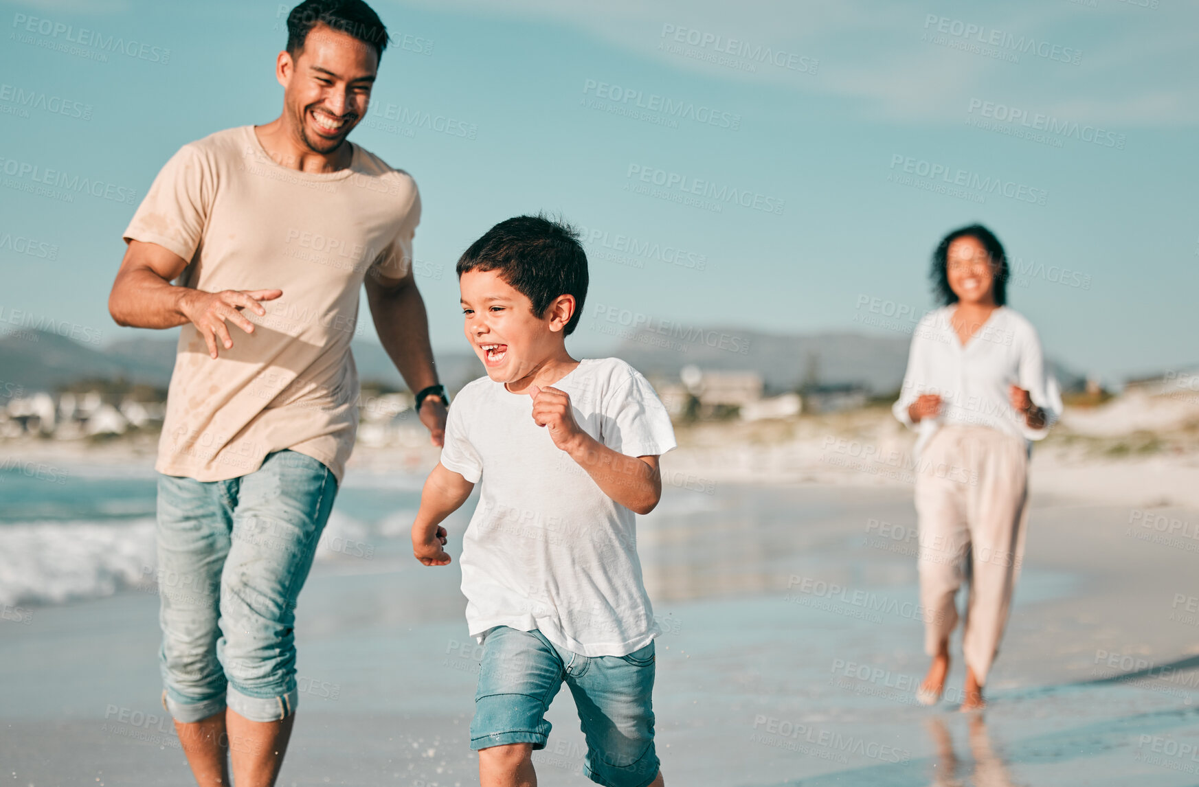 Buy stock photo Family, father and son running on beach with mother, ocean and energy with bonding on holiday, happiness and freedom. Parents, boy and carefree on tropical vacation in Mexico, love and care outdoor