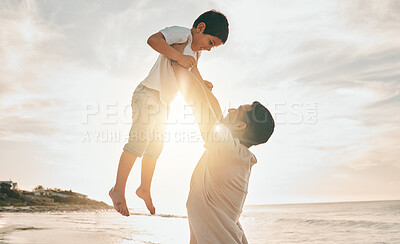 Buy stock photo Beach, love and father lifting boy child with freedom, smile and travel celebration in nature. Flying, fun and parent with kid at the ocean for bond, happy and airplane game while traveling in Bali