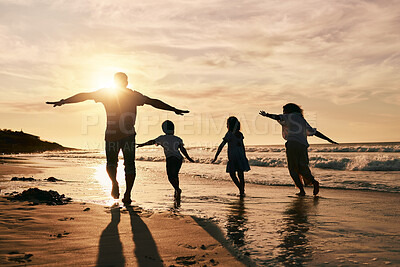 Buy stock photo Silhouette, family is running on beach and back view with ocean waves, sunset and bonding in nature. Energy, action people outdoor on tropical holiday and freedom, travel with trust and love 