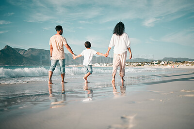 Buy stock photo Holding hands, walking and family and the beach from behind with freedom, vacation and fun at the sea. Ocean, back and  boy child together with parents in Mexico for travel, bond or summer holiday