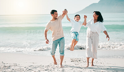 Buy stock photo Holding hands, dad or mother playing child at beach with a happy family for holiday vacation travel in nature. Jump, parents or mom lifting child with dad walking at sea or ocean bonding together