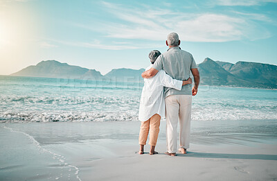 Buy stock photo Back, hug or old couple on beach to relax with love, care or support on summer vacation in nature. Retirement, mature man or senior woman at sea or ocean to travel on holiday together looking at view