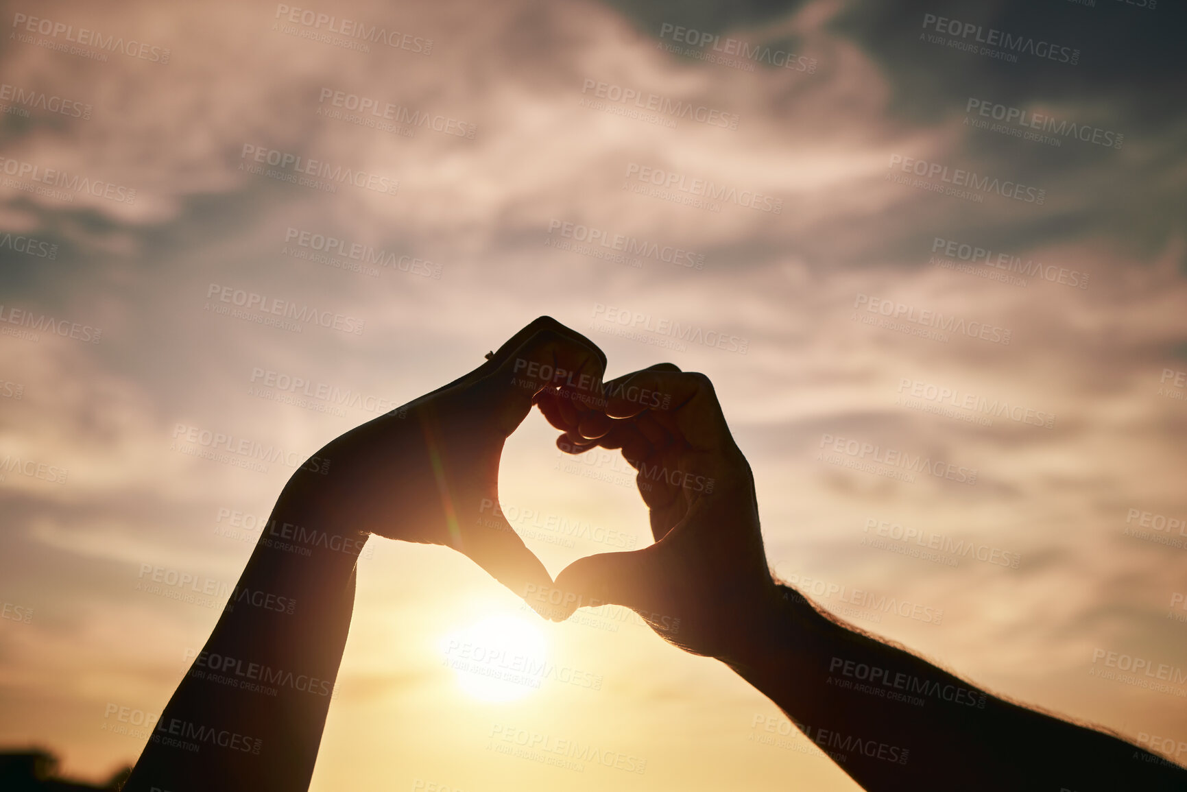Buy stock photo Heart hands, sunset on beach and silhouette with love and romance sign, people travel and outdoor. Adventure, emoji and care with health in nature, support and commitment, couple with trust and sea