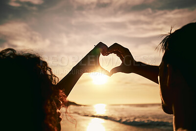 Buy stock photo People with heart hands, sunset on beach, silhouette with love and romance sign, travel and outdoor. Adventure, emoji and care with health in nature, support and commitment, couple with trust and sea