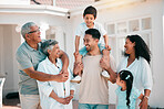 Happy, love and big family together outdoor for fresh air in the backyard of their modern house. Happiness, smile and children bonding and posing with their grandparents and parents in garden by home