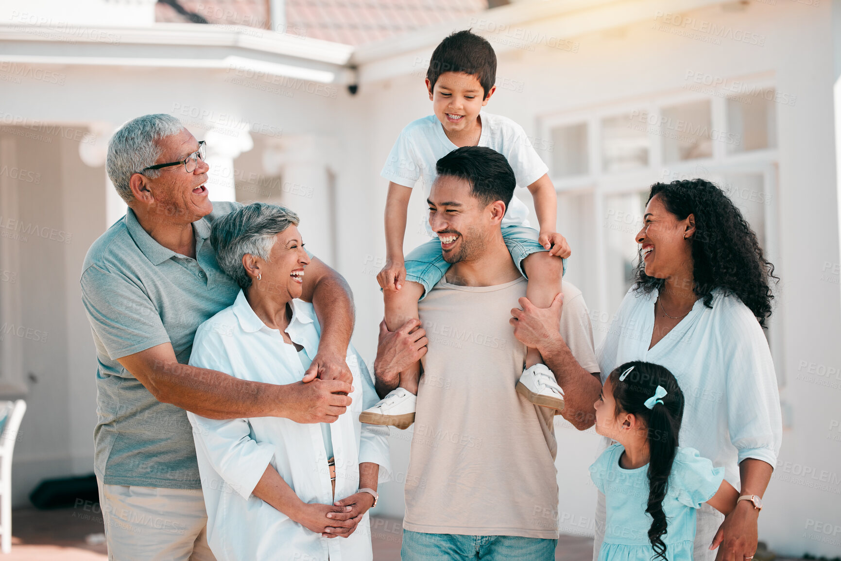 Buy stock photo Happy, love and big family together outdoor for fresh air in the backyard of their modern house. Happiness, smile and children bonding and posing with their grandparents and parents in garden by home