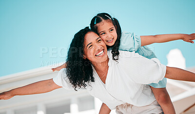 Buy stock photo Smile, airplane and mother with her child in the outdoor garden at their family home for adventure. Playful, happy and young mom carrying her girl kid on her back while bonding and playing together.