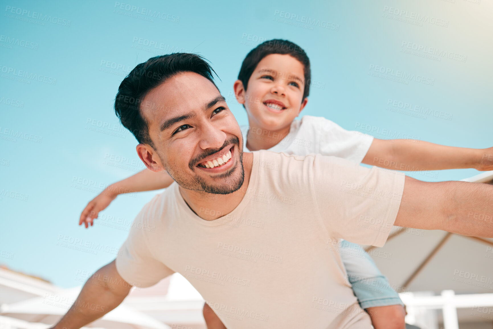 Buy stock photo Happy, relax and piggyback with father and son in backyard for playful, support and airplane. Happiness, smile and love with man and child at family home for care, excited and games together