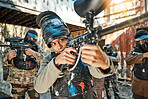 Paintball team, gun and woman aim, focus and shooting at target practice, competition or military conflict, fight or mission. Group, soldier or people point weapon in survival war, training or battle