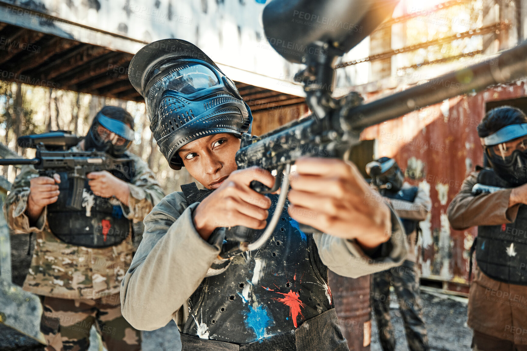 Buy stock photo Paintball team, gun and woman aim, focus and shooting at target practice, competition or military conflict, fight or mission. Group, soldier or people point weapon in survival war, training or battle