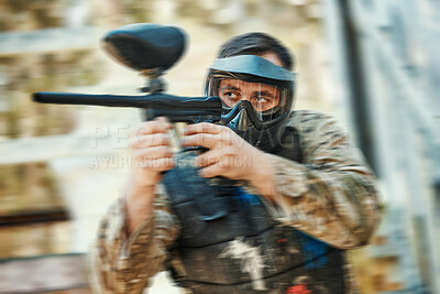 Buy stock photo Paintball gun, focus and man aim, shooting and target soldier, action warrior or training for battlefield fight conflict. Army mission gear, blur and male shooter in war, battle or military practice 