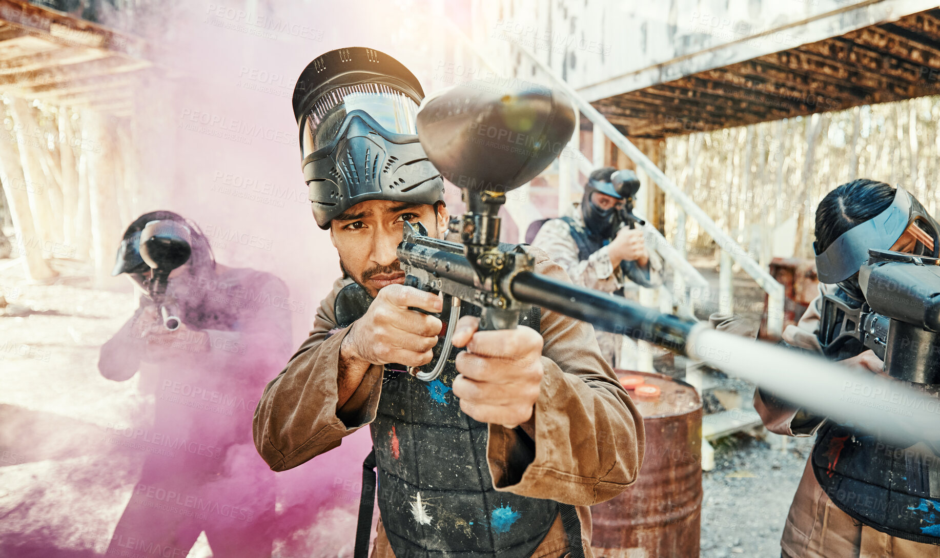 Buy stock photo Teamwork, smoke and paintball with man in game for playground, war and sports gaming. Challenge, mission and soldier with people shooting in battlefield arena for target, gun and warrior training