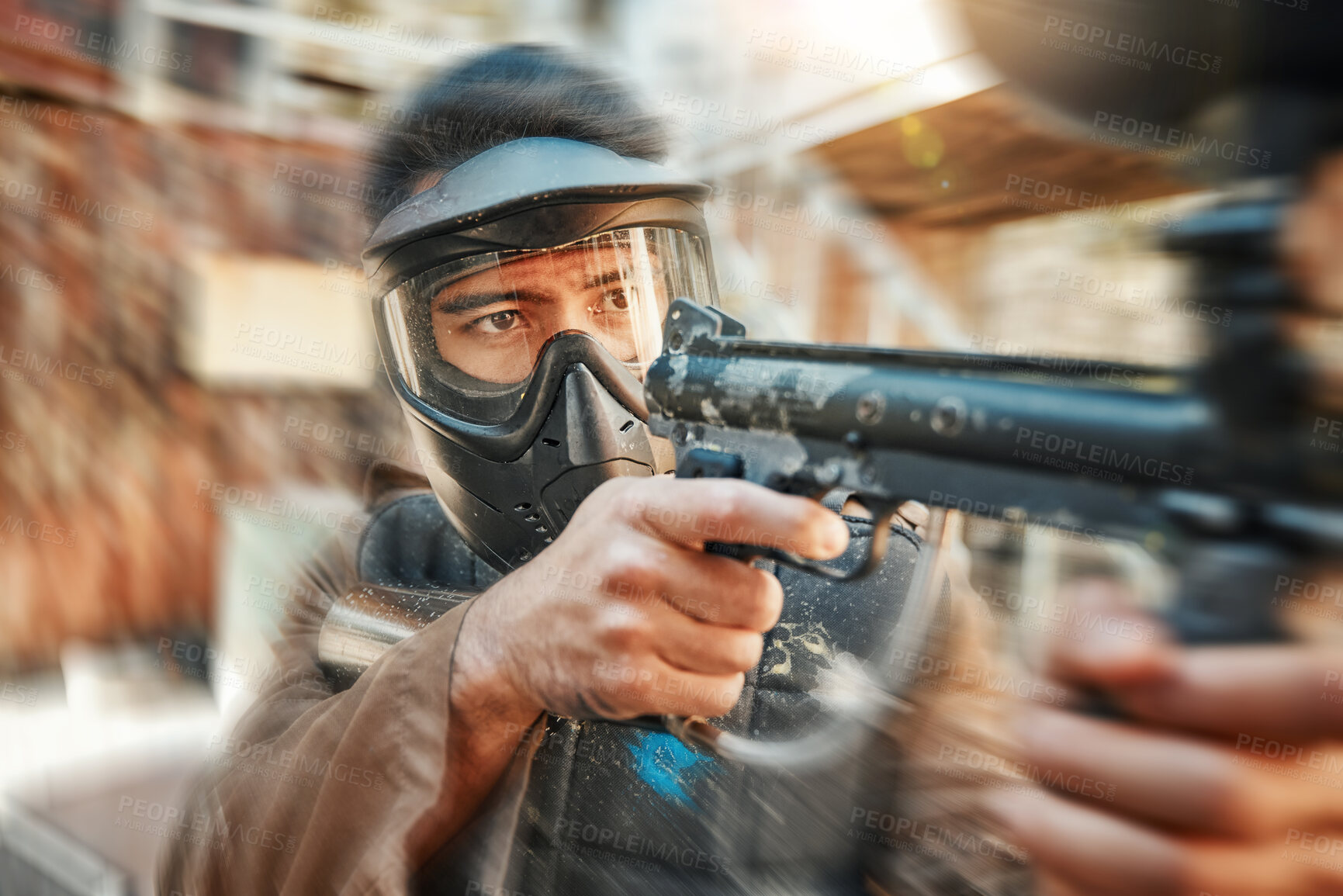 Buy stock photo Paintball, blur and man in action with gun for tournament, competition and battle in nature. Camouflage, sports and male person shooting in outdoor arena for training, adventure games and challenge