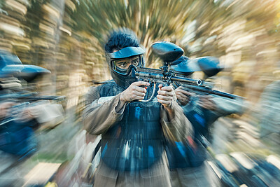 Buy stock photo Paintball, action and team of friends ready for a battle and teamwork, collaboration and shooting game together. Serious, blur and army on a mission on the battlefield with guns for competition