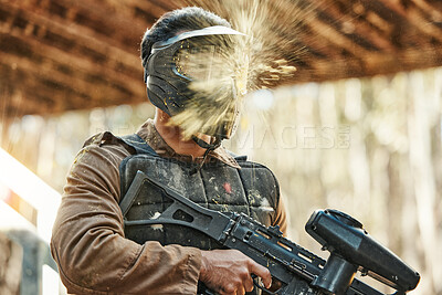 Buy stock photo Paintball gun, man and splash on mask, shooting and target with attack, strategy and gear for safety in outdoor combat. Military exercise, splatter and battlefield action with headshot for war game