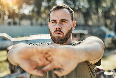 Buy stock photo Focus, stretching and a man in nature for fitness, running idea and thinking of motivation for a workout. Serious, hands and an athlete with a vision for training, exercise or a warm up in a park