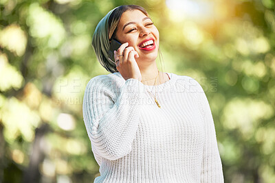 Buy stock photo Woman, phone call and talk with laugh in park, communication and funny chat in summer sunshine. Muslim student girl, smartphone and comic conversation with listening, contact and thinking outdoor
