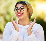 Young woman, smile and happy face outdoor in nature with glasses and freedom in summer. Fashion, style and gen z female model or student with a turban scarf, happiness and positive mindset at park