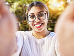 Young woman, smile and happy selfie outdoor in nature with glasses in summer. Fashion, style and gen z female student or influencer portrait with happiness, peace and freedom on profile picture