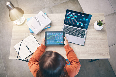 Buy stock photo Woman at desk with laptop, tablet and data analytics for research in business management in stock market trading. Technology, dashboard app to study graphs and charts, trader in office from above.