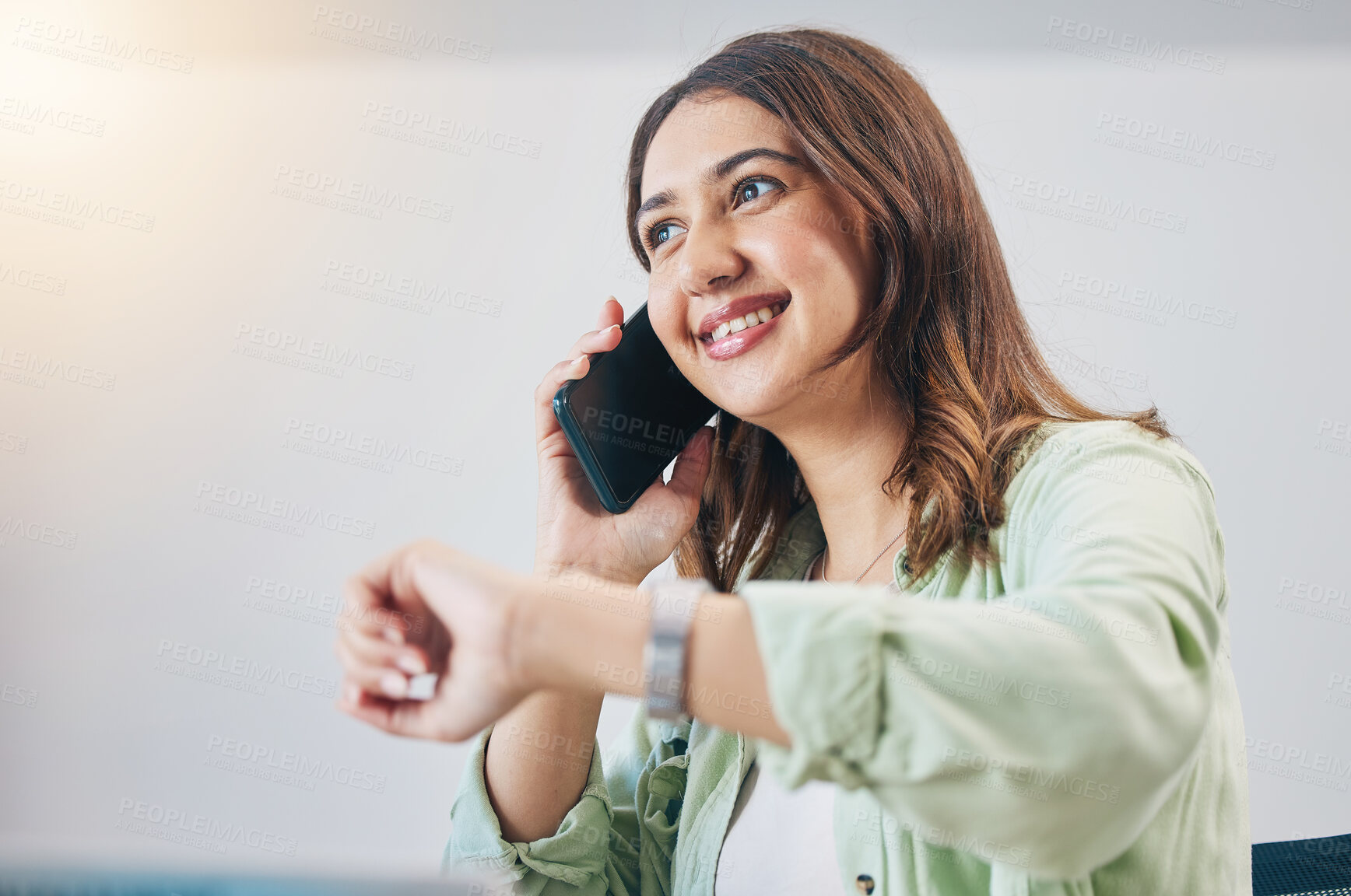 Buy stock photo Phone call, watch and woman checking the time in the office while talking on a cellphone. Happy, smile and young female person on a mobile conversation with technology for a schedule in the workplace