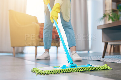 Buy stock photo Woman, hands and cleaning floor with mop in living room for hygiene, bacteria or germ removal at home. Female person, housekeeper or maid in domestic service, dirt or dust for disinfection in house