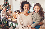 Christmas, portrait and mother with girl, happy together and bonding in home. Xmas, smile and face of kid with African mom, interracial and adoption at family party, celebration and winter holiday
