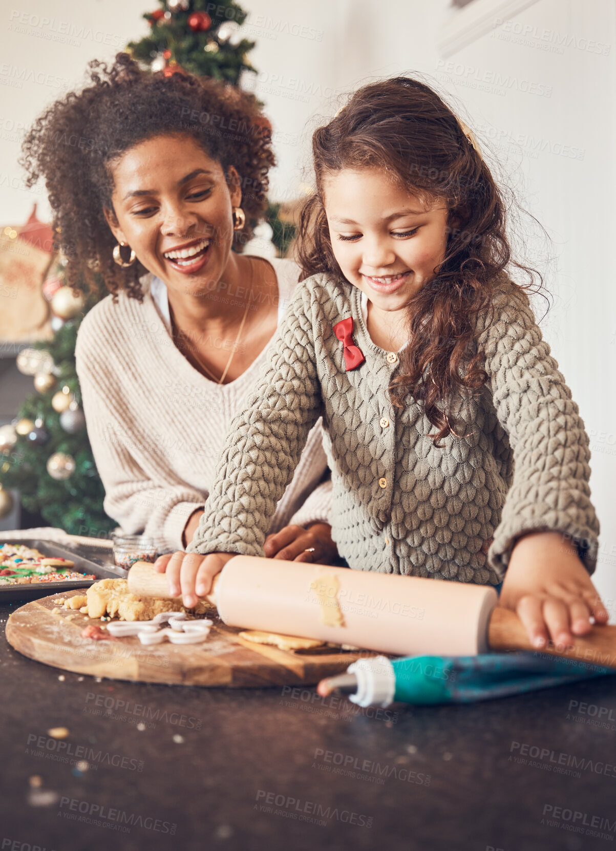 Buy stock photo Kid, baker and mother on christmas with happiness for teaching on kitchen counter for lunch. Smile, child and learning with cookies with parent for festive season in home with bond or development.