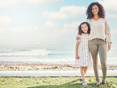 Buy stock photo Portrait, happy mother and girl at beach on holiday, vacation or summer travel for bonding together. Sea, kid and African mom with child, love and care with a smile for family time outdoor by ocean
