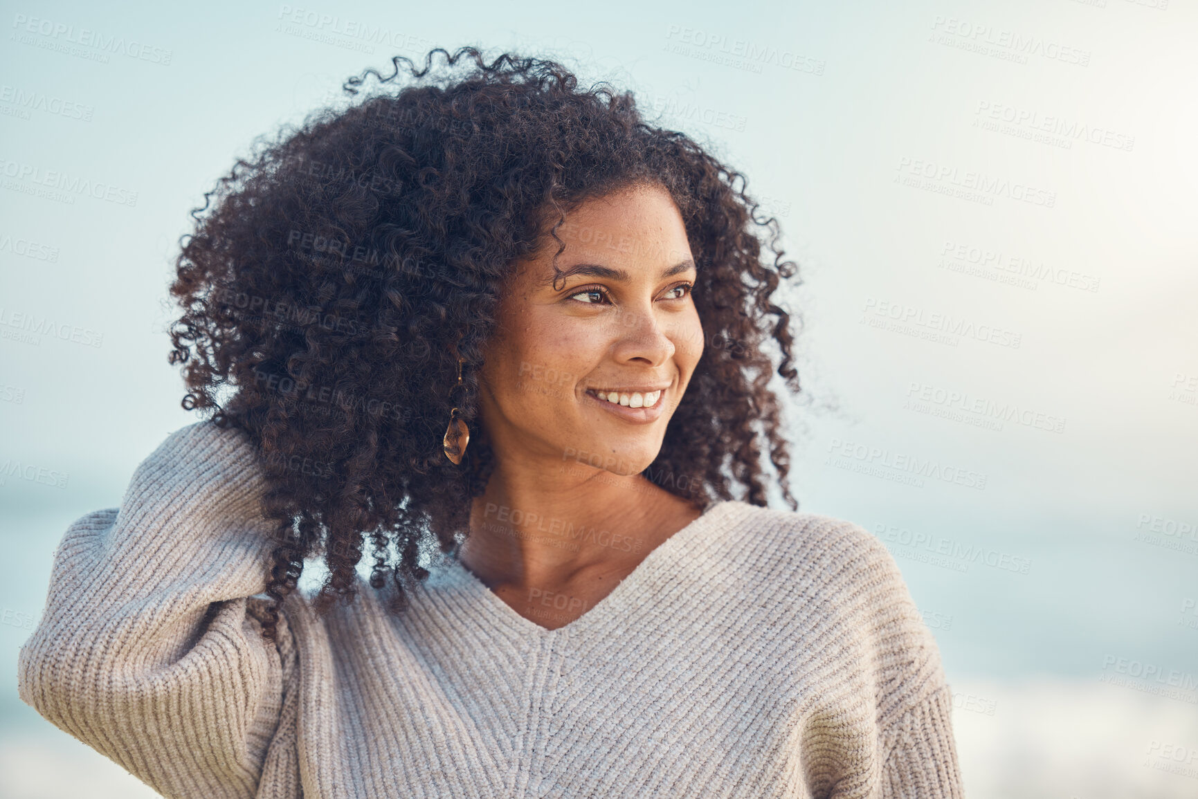 Buy stock photo African woman, thinking and happiness at the beach, ocean or idea for holiday, vacation or summer at the sea in Puerto Rico. Travel, freedom and smile on face for nature, adventure and blue sky