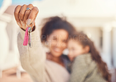 Buy stock photo Hand, real estate and a person with keys to a house for a property for a child and single mother. Realtor showing, family and a woman moving into a new home or apartment with a girl kid together