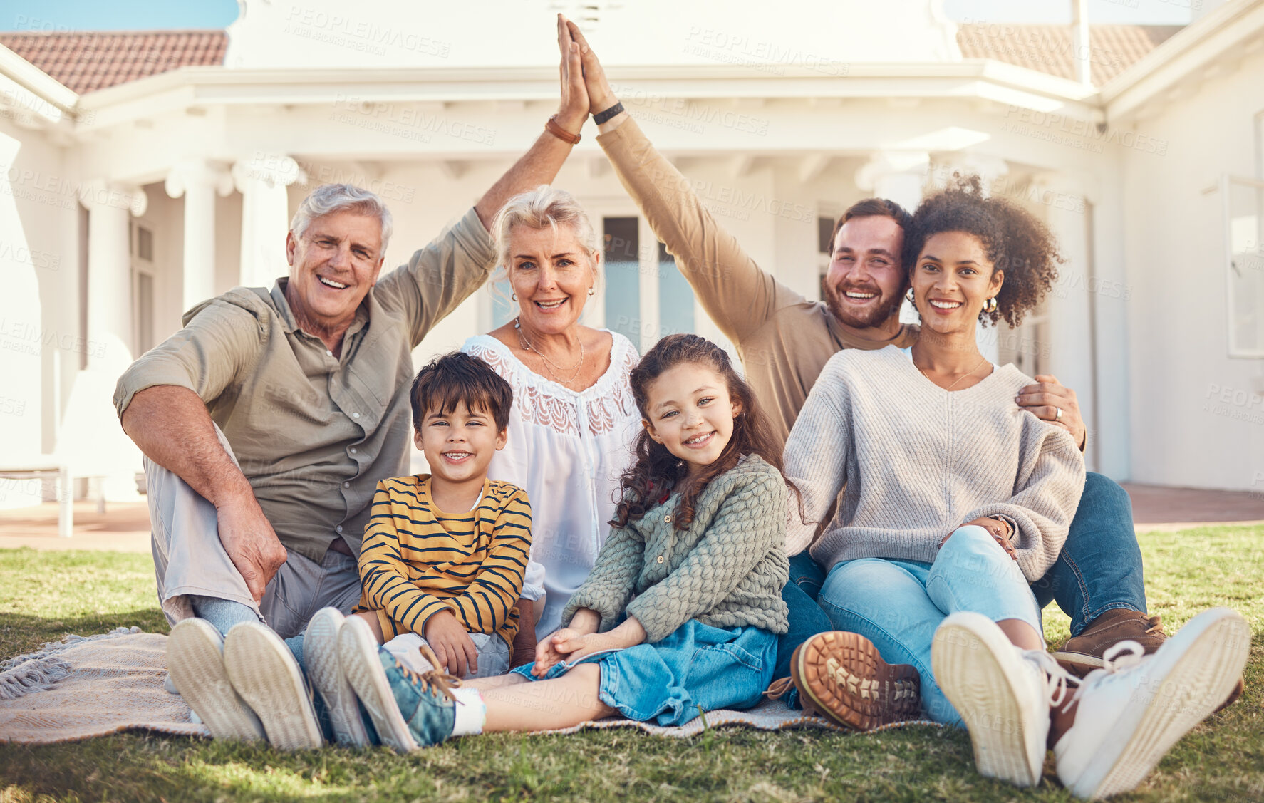 Buy stock photo Portrait, high five and a family in the garden of their home together during a visit with grandparents. Diversity, love and children with their parents on a lawn in the backyard for bonding in summer