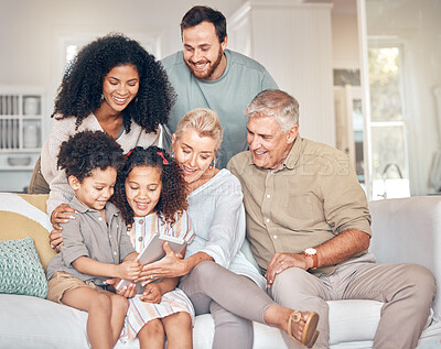 Buy stock photo Big family, tablet and children in home, happy and bonding together in living room. Technology, multiracial kids and grandparents with parents in lounge streaming movie, video or film on social media