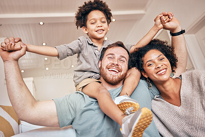 Buy stock photo Mom, dad and boy on shoulders, piggyback and portrait in home with smile, holding hands and solidarity. Interracial family house, mother and father with son, playing plane games and bonding with love