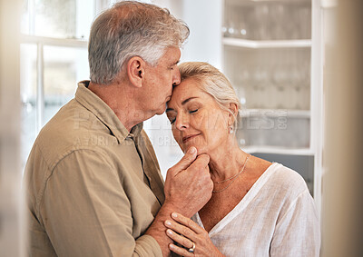 Buy stock photo Home, kiss and senior couple with love and commitment while together for quality time and bonding. Elderly woman and a man relax in a room with care, support and security in a healthy marriage 