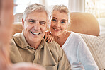 Happy senior couple, face and selfie in relax on living room sofa for photograph, memory or vlog at home. Elderly man and woman smile for picture, photo or social media post on lounge couch together