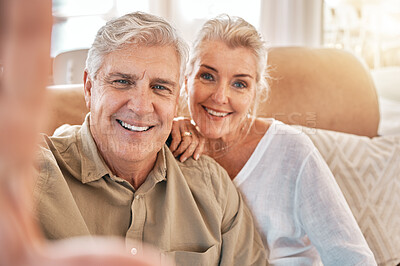 Buy stock photo Happy senior couple, face and selfie in relax on living room sofa for photograph, memory or vlog at home. Elderly man and woman smile for picture, photo or social media post on lounge couch together