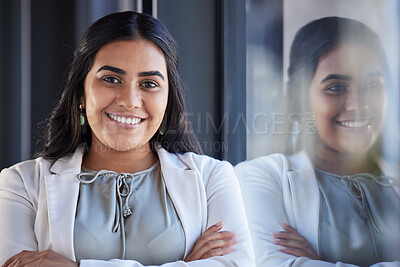 Buy stock photo Business woman, smile and happy portrait in an office with arms crossed and career pride. Face of a young female entrepreneur with confidence, positive mindset and commitment to corporate startup