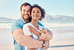 Beach, love and portrait of couple hugging in nature, holiday or romantic outdoor date together at the ocean, sea or sand. Happy, smile and people in a hug, embrace or happiness on anniversary