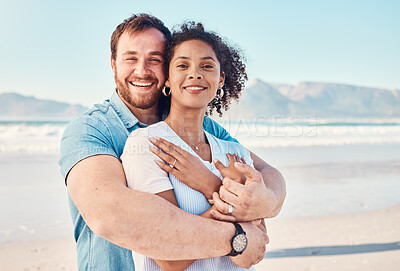 Buy stock photo Beach, love and portrait of couple hugging in nature, holiday or romantic outdoor date together at the ocean, sea or sand. Happy, smile and people in a hug, embrace or happiness on anniversary