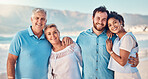 Portrait, diversity and love with a blended family on the beach together in summer for vacation or holiday. Senior parents, smile and in laws with a group of people standing y by the ocean or sea