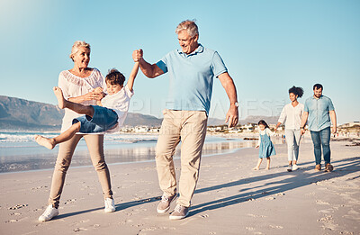 Buy stock photo Swinging, grandparents and a child walking on the beach on a family vacation, holiday or adventure in summer. Young boy kid holding hands with a senior man and woman outdoor with fun energy or game