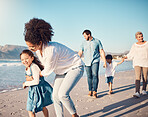 Happy, child and a mother running at the beach on a family vacation, holiday or adventure in summer. Young girl kid playing with a woman outdoor with fun energy, happiness and love by the ocean