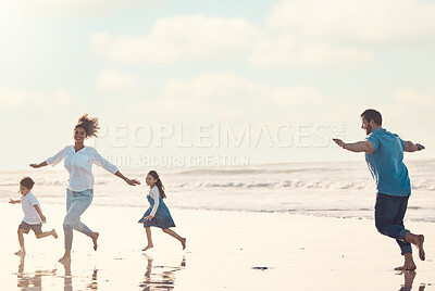 Buy stock photo Mother, father and children on the beach to dance together while outdoor for travel or vacation in summer. Sunset, family or children and siblings having fun with parents on the coast by the ocean