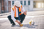 Tablet, solar panels and engineering man on rooftop, city and urban development, sustainability or energy saving installation. Digital technology, inspection and electrician or person with power grid