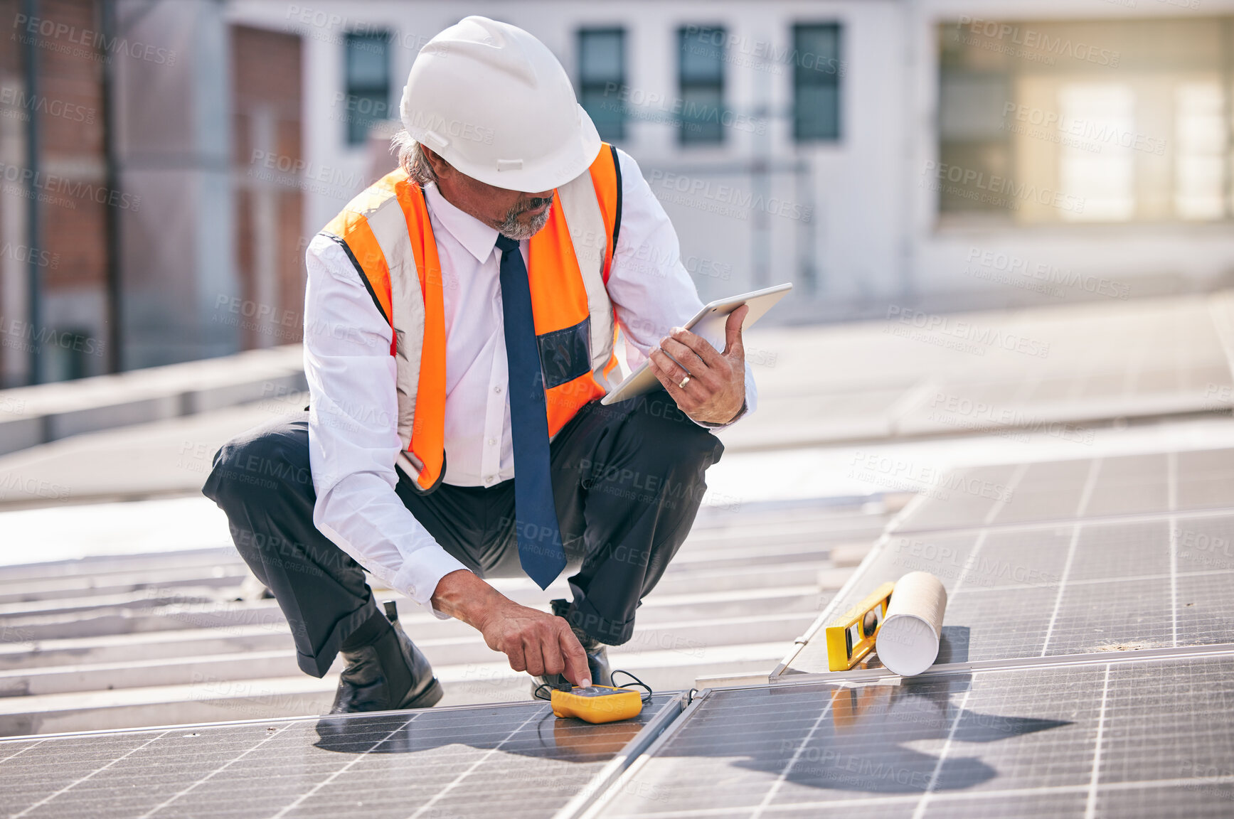 Buy stock photo Tablet, solar panels and engineering man on rooftop, city and urban development, sustainability or energy saving installation. Digital technology, inspection and electrician or person with power grid