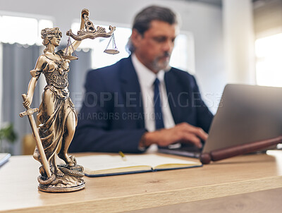 Buy stock photo Justice, statue and man in office with laptop at law firm desk, online research for court advice and senior lawyer. Judge, attorney or legal consultant in human rights, computer and internet search.