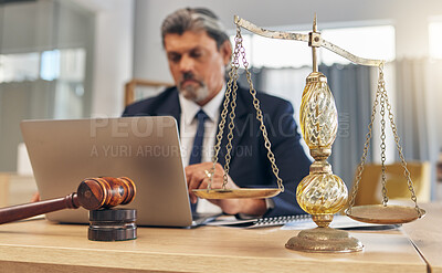 Buy stock photo Scales, gavel and man in office with laptop at law firm, online research for court advice and senior lawyer at desk. Judge, attorney or legal consultant job with justice, computer and internet search