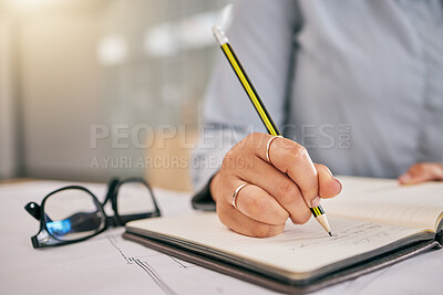 Buy stock photo Hand, book and a architect woman writing a note in her journal, diary or planner to remember an appointment. Planning, schedule and notebook with a female engineer sitting in her office closeup